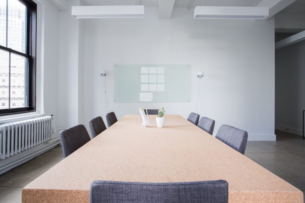 Empty meeting room with a long table